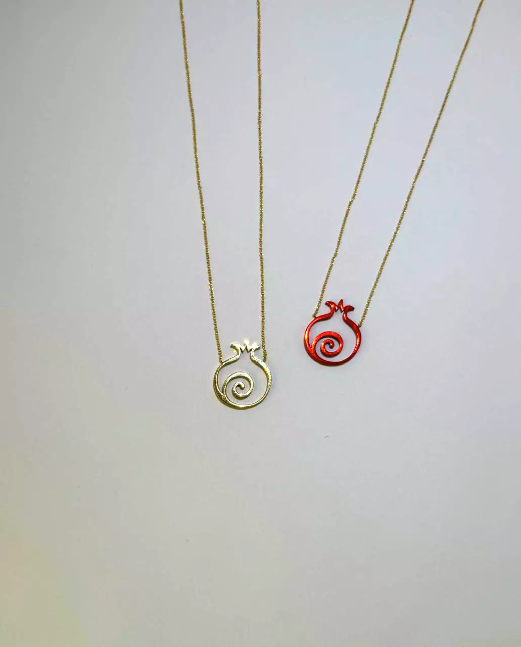 Gold necklace on a neutral background